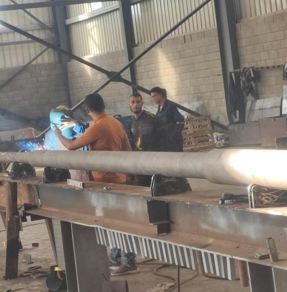 Fabrication and hot galvanizing for overhead transmission line