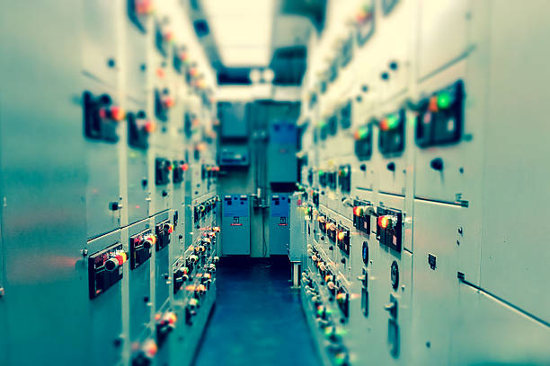 Vintage and blur tone of Electrical switchgear room,Industrial electrical switch panel on plant and process control with grainy style.